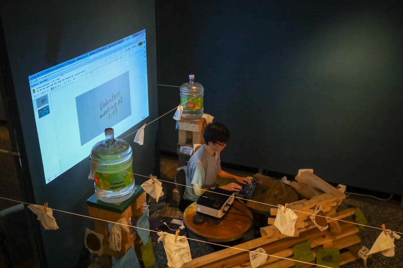 The full Engine installation seen across the room, string running between all four towers.