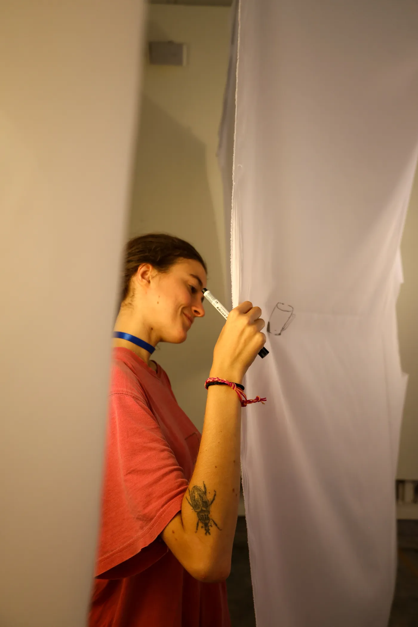 A detail of marker lines on semi-transparent fabric.