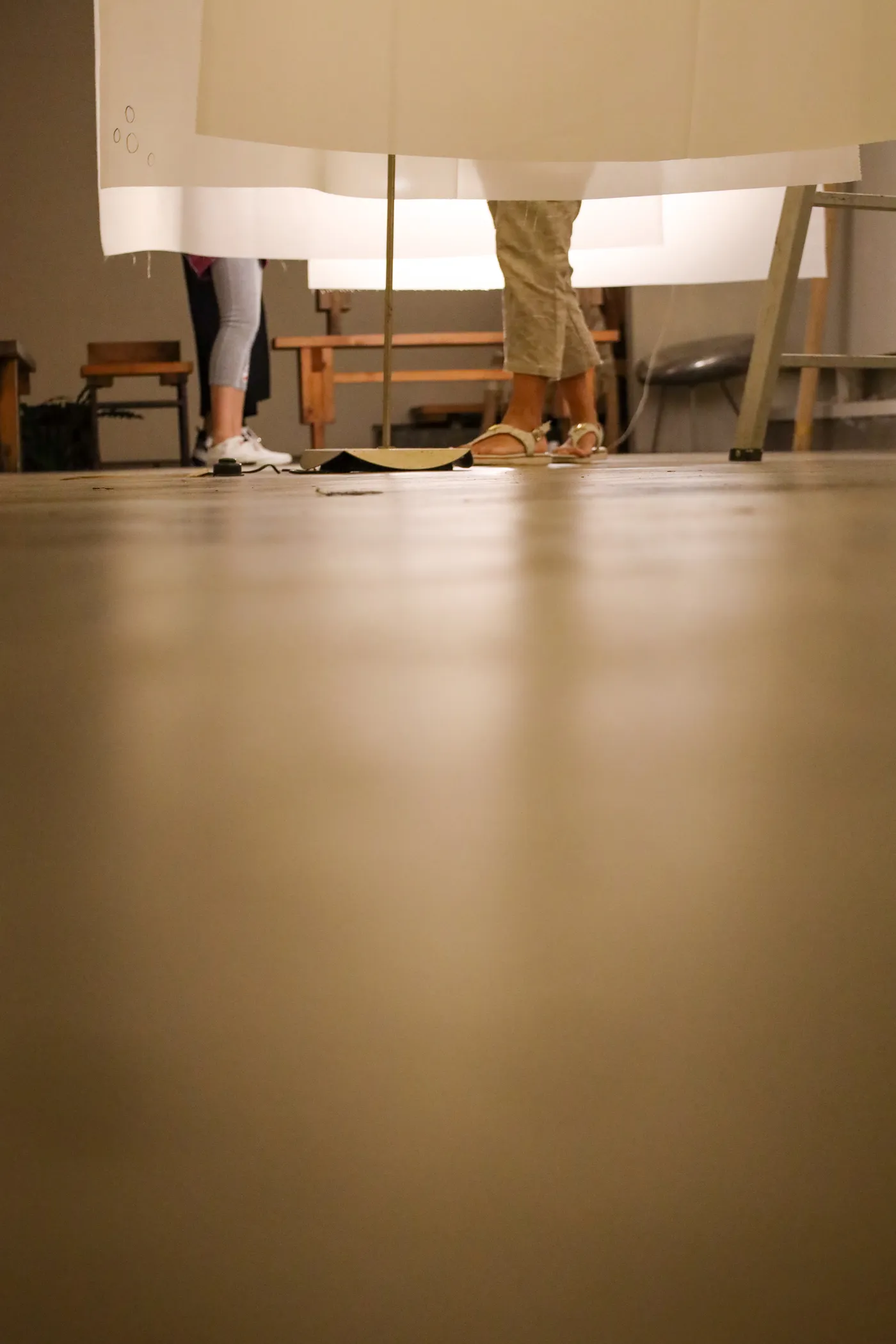 Two visitors conferring over what to add next.